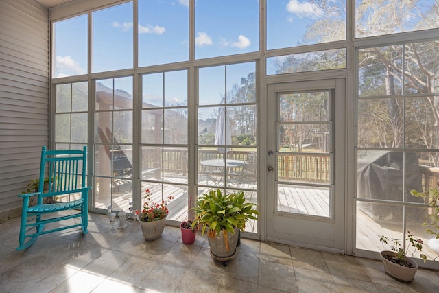 sunroom featuring a wealth of natural light