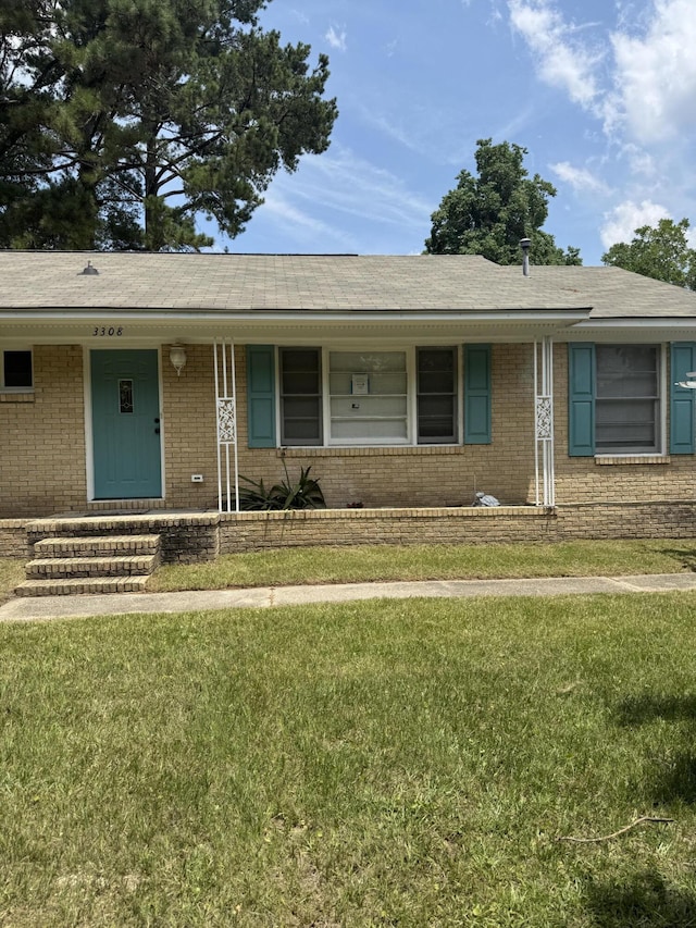 3308 Londonderry Rd, North Charleston, SC 29420 - single story home featuring brick siding, a front yard, and a shingled roof