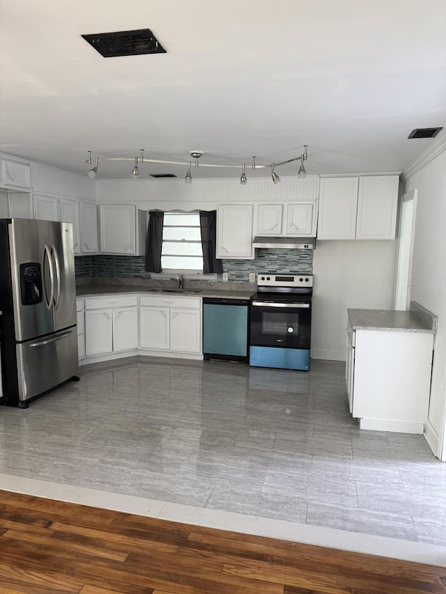 3308 Londonderry Rd, North Charleston, SC 29420 - kitchen with stainless steel appliances, dark countertops, and white cabinetry