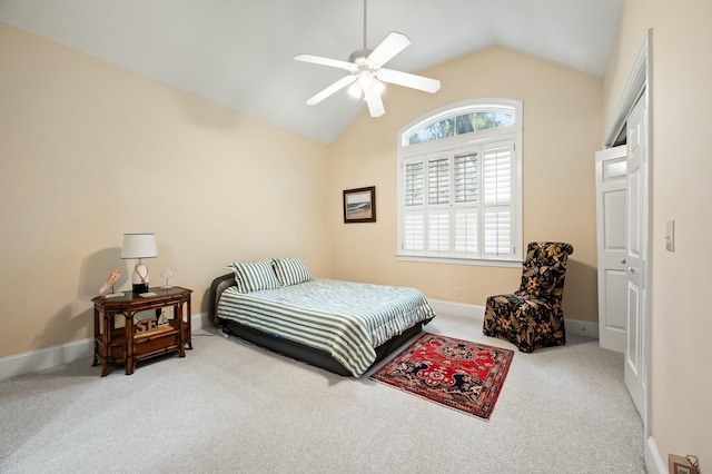 bedroom with baseboards, ceiling fan, carpet, and vaulted ceiling