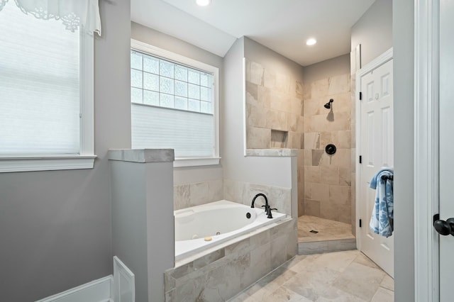 full bath featuring a whirlpool tub, a walk in shower, and recessed lighting