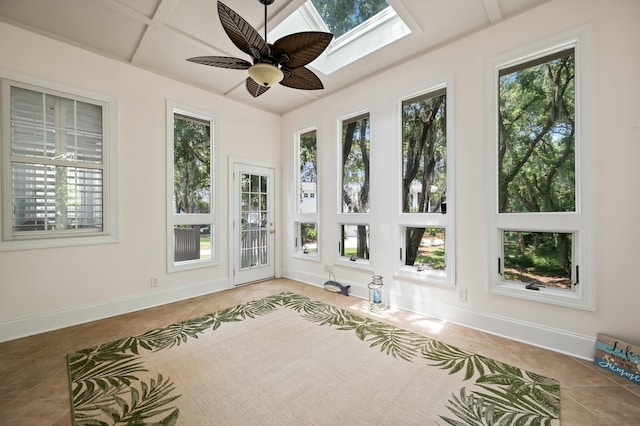 unfurnished sunroom with tile patterned flooring and a wealth of natural light
