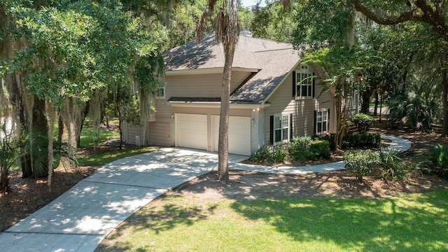view of front of home featuring concrete driveway, a chimney, a front lawn, a garage, and a shingled roof
