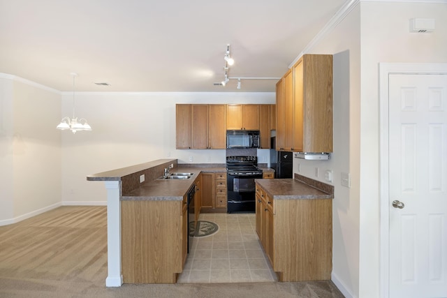 kitchen featuring decorative light fixtures, a kitchen bar, light carpet, ornamental molding, and black appliances