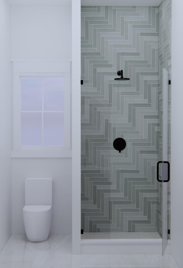 interior details with a shower with shower door and toilet