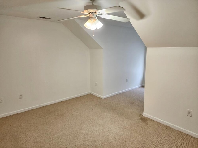 bonus room with light colored carpet, ceiling fan, and lofted ceiling