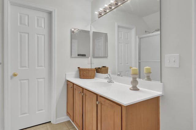 bathroom with vanity and tile patterned floors