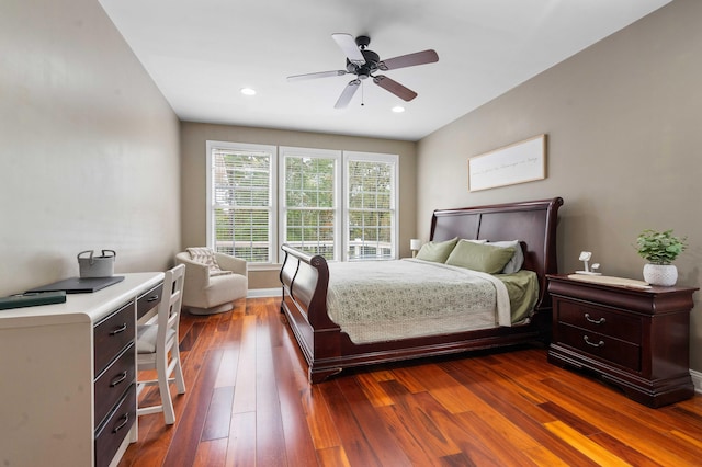 bedroom with dark wood-type flooring and ceiling fan