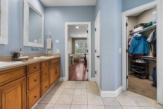 bathroom featuring vanity and tile patterned floors