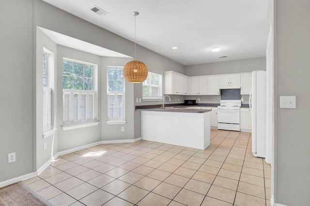 434 Antebellum Ln, Mount Pleasant, SC 29464 - kitchen with white appliances, white cabinetry, a sink, dark countertops, and decorative light fixtures