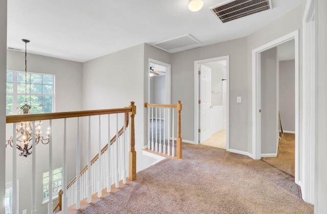 434 Antebellum Ln, Mount Pleasant, SC 29464 - corridor featuring an upstairs landing, carpet floors, baseboards, and a chandelier