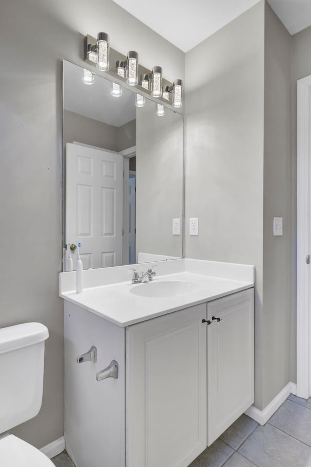 434 Antebellum Ln, Mount Pleasant, SC 29464 - bathroom with vanity, toilet, baseboards, and tile patterned floors