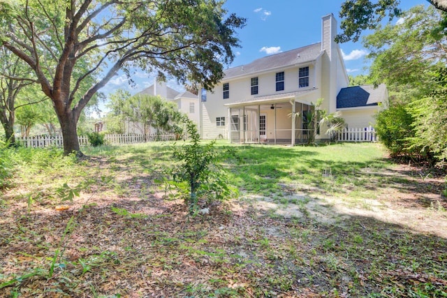 434 Antebellum Ln, Mount Pleasant, SC 29464 - rear view of property featuring ceiling fan, a sunroom, and a chimney