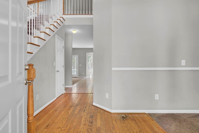 434 Antebellum Ln, Mount Pleasant, SC 29464 - entryway featuring baseboards, wood-type flooring, and stairway
