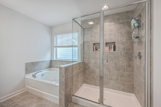 bathroom featuring plus walk in shower