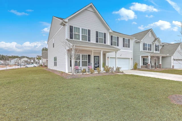 view of front facade featuring a porch, a garage, and a front lawn