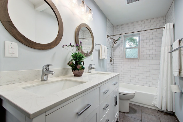 5043 Victoria Ave, North Charleston, SC 29405 - full bathroom featuring double vanity, shower / bath combo with shower curtain, and toilet