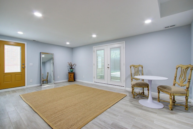 5043 Victoria Ave, North Charleston, SC 29405 - living area with french doors, light wood-type flooring, recessed lighting, and baseboards