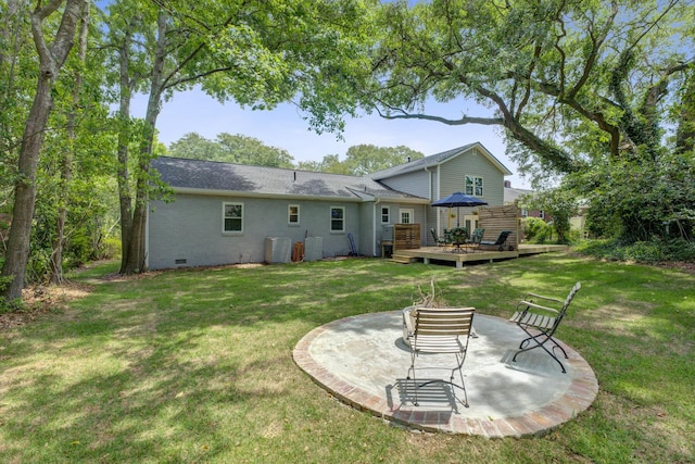 5043 Victoria Ave, North Charleston, SC 29405 - back of house featuring crawl space, a deck, a patio area, a yard, and cooling unit
