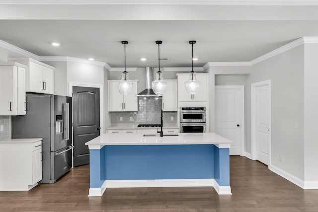 512 Pontoon Rd, Huger, SC 29450 - kitchen with stainless steel appliances, wall chimney exhaust hood, light countertops, tasteful backsplash, and an island with sink