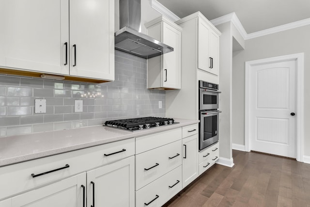 512 Pontoon Rd, Huger, SC 29450 - kitchen with wall chimney exhaust hood, stainless steel appliances, crown molding, dark wood finished floors, and white cabinets