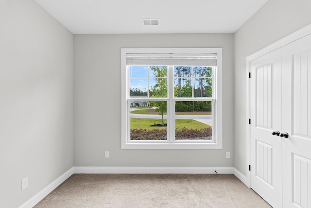 512 Pontoon Rd, Huger, SC 29450 - unfurnished room featuring light carpet and baseboards