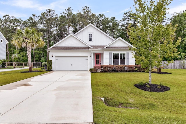 512 Pontoon Rd, Huger, SC 29450 - view of front of house with a garage, driveway, and board and batten siding