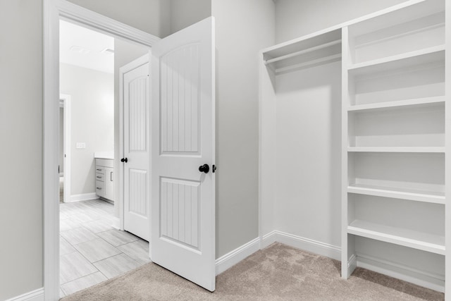 512 Pontoon Rd, Huger, SC 29450 - walk in closet featuring light carpet