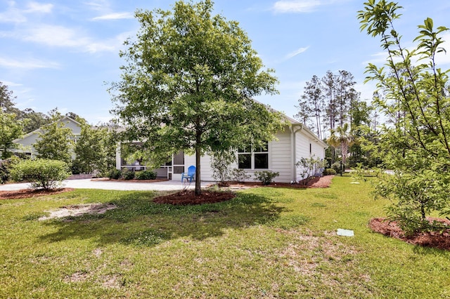 512 Pontoon Rd, Huger, SC 29450 - view of green lawn with driveway