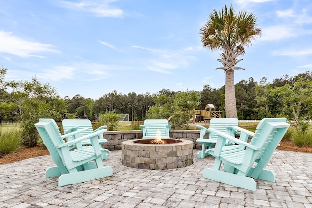 512 Pontoon Rd, Huger, SC 29450 - view of patio featuring a fire pit and a playground