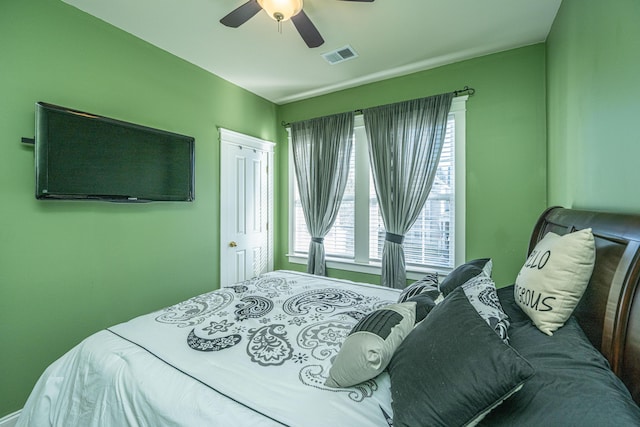 bedroom featuring a closet and ceiling fan