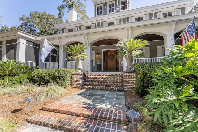 entrance to property with covered porch