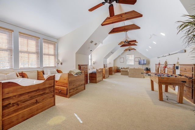 playroom with light carpet, lofted ceiling with beams, and ceiling fan