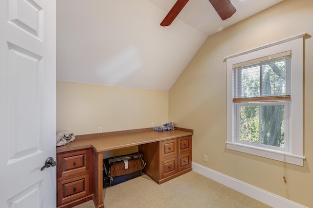 office area with light carpet, ceiling fan, and vaulted ceiling