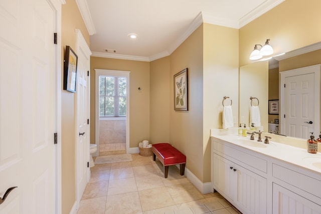 bathroom featuring vanity, a shower, tile patterned floors, toilet, and ornamental molding