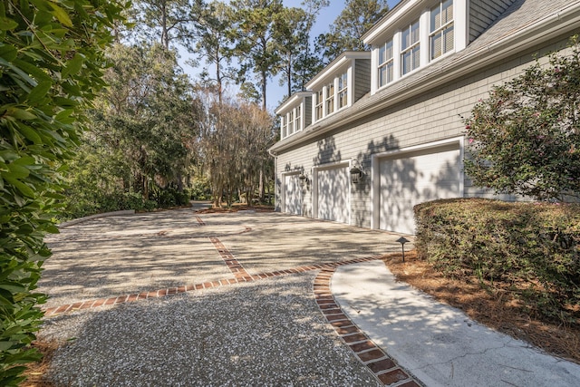 view of side of property featuring a garage