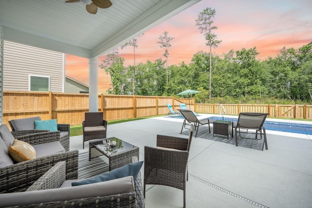 224 Wappoo Trace Ln, Summerville, SC 29486 - patio terrace at dusk featuring an outdoor hangout area, a ceiling fan, a patio, a fenced backyard, and outdoor dining space