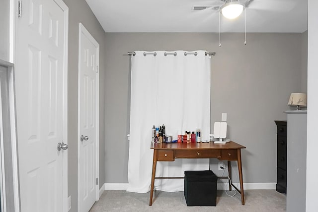 home office with ceiling fan