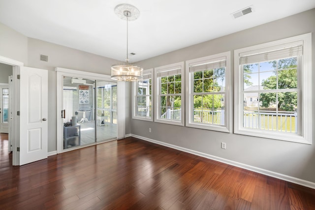 1232 Palmetto Peninsula Dr, Mount Pleasant, SC 29464 - unfurnished dining area with baseboards, a chandelier, and dark wood finished floors