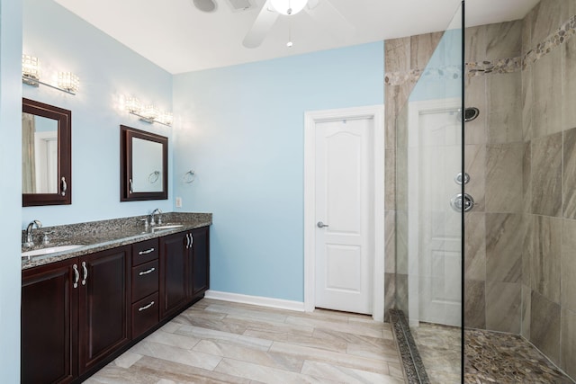 1232 Palmetto Peninsula Dr, Mount Pleasant, SC 29464 - bathroom featuring ceiling fan, walk in shower, double vanity, and baseboards