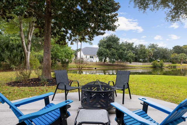 1232 Palmetto Peninsula Dr, Mount Pleasant, SC 29464 - view of patio / terrace with a fire pit and a water view