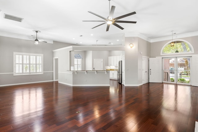 1232 Palmetto Peninsula Dr, Mount Pleasant, SC 29464 - unfurnished living room featuring ceiling fan, crown molding, baseboards, dark wood-style floors, and recessed lighting
