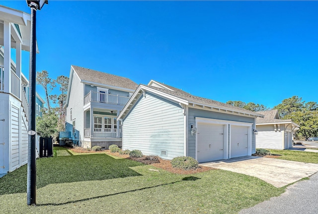 view of home's exterior featuring a garage, crawl space, a yard, and a shingled roof