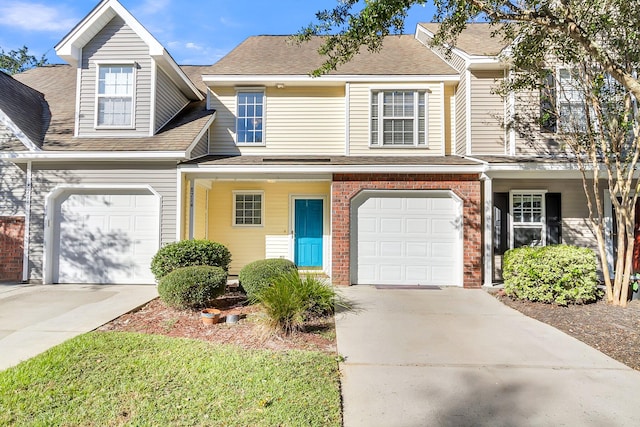 view of front of property with a garage