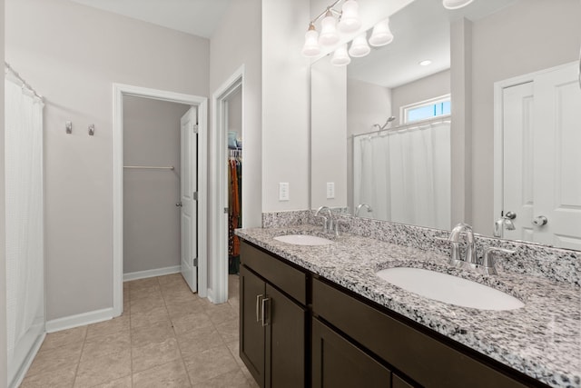 bathroom with vanity, tile patterned floors, and a shower with shower curtain