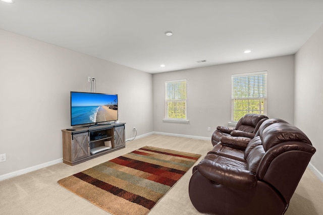 living room featuring light carpet