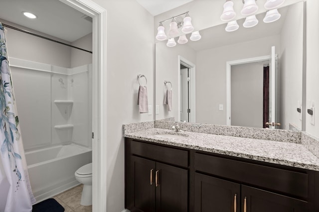 full bathroom with vanity, toilet, and shower / tub combo