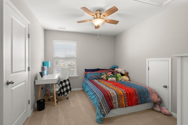 carpeted bedroom featuring ceiling fan