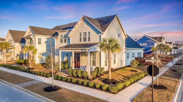 view of front of house featuring a residential view and a porch