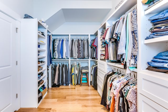 spacious closet with light wood-style floors